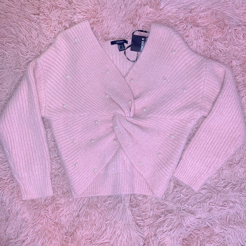 A FOREVER 21 knit sweater with faux pearls, long sleeves, and twist-front hem!